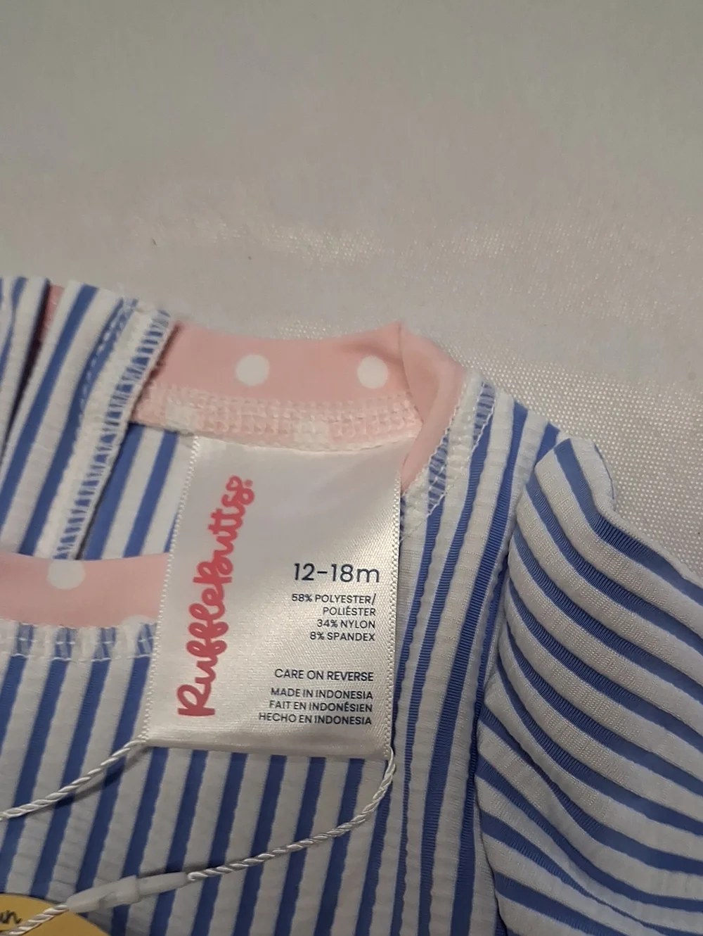 NWT RuffleButts Blue and White Striped Baby Swimsuit with Pink Tag